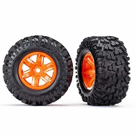 Traxxas 7772T Tires & wheels assembled glued (X-Maxx® orange wheels Maxx® AT tires foam inserts) (left & right) (2) - Excel RC